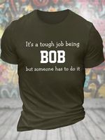 Men's Funny It's A Tough Job Being Bob But Someone Has To Do It Graphic Printing Loose Text Letters Casual T-Shirt - thumbnail