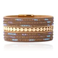 DEJA Statement Armband goudkleurig met kristallen in beige