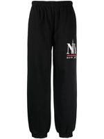 Alexander Wang pantalon de jogging à logo imprimé - Noir - thumbnail