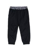 Versace Kids pantalon fuselé à bande Greca - Bleu