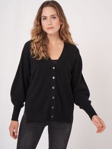 V-hals vest met knopen en pofmouwen