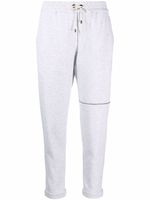 Brunello Cucinelli pantalon de jogging à rayures - Gris