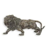 A BRONZE SCULPTURE OF A LION