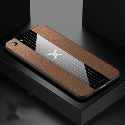 Voor OPPO A83 XINLI stiksels doek Textue schokbestendig TPU beschermhoes (bruin)