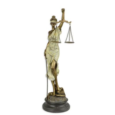 A RESIN FIGURINE OF LADY JUSTICE