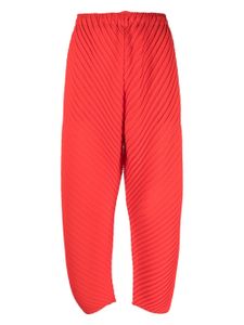 Issey Miyake pantalon droit à effet plissé - Rouge