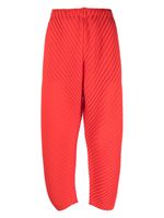 Issey Miyake pantalon droit à effet plissé - Rouge