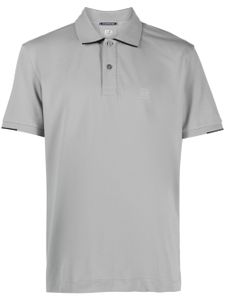 C.P. Company polo à logo imprimé - Gris