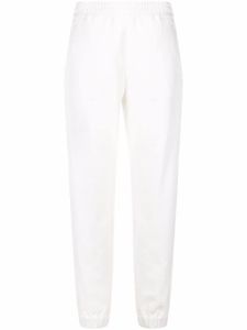 Moncler pantalon de jogging fuselé en coton - Blanc