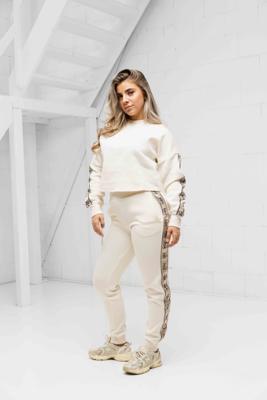 Guess Cymone Trainingspak Dames Beige - Maat L - Kleur: Beige | Soccerfanshop