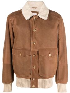 Brunello Cucinelli veste boutonnée en cuir à manches longues - Marron