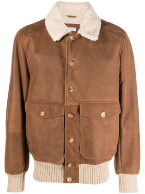 Brunello Cucinelli veste boutonnée en cuir à manches longues - Marron
