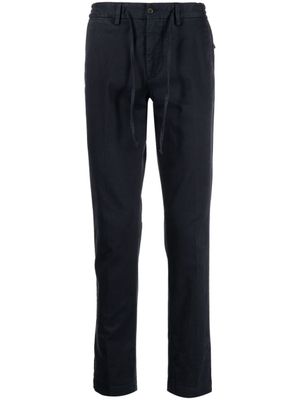 Corneliani pantalon fuselé à lien de resserrage - Bleu