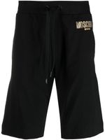 Moschino short de sport strassé à logo imprimé - Noir