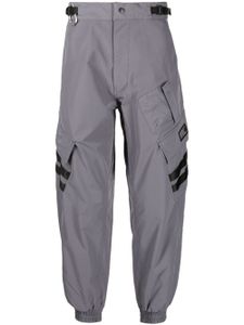 izzue pantalon fuselé à poches cargo - Gris