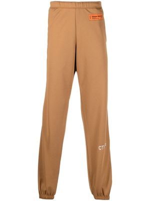 Heron Preston pantalon de jogging à patch logo - Marron