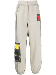 A-COLD-WALL* pantalon de jogging à patch brodé - Gris