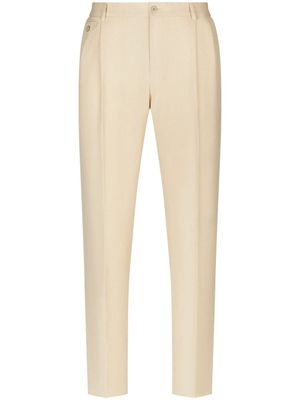 Dolce & Gabbana pantalon de costume à plis marqués - Tons neutres