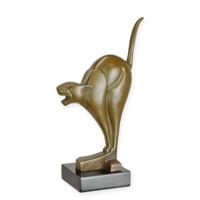A BRONZE SCULPTURE OF AN ART DECO CAT
