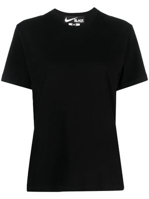 Black Comme Des Garçons x Nike t-shirt à slogan imprimé - Noir