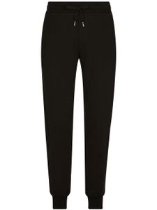 Dolce & Gabbana pantalon de jogging à patch logo - Noir