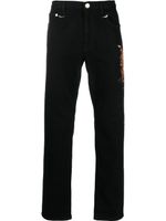 Roberto Cavalli jean slim à imprimé tigre - Noir