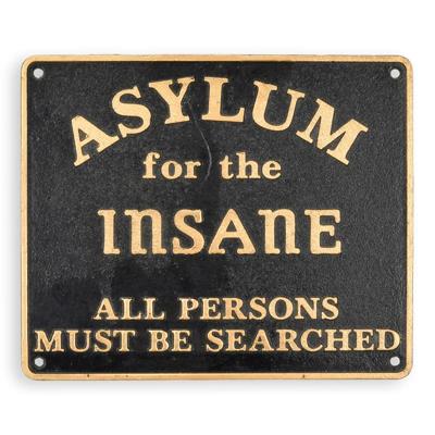 A CAST IRON "ASYLUM FOR THE INSANE" PLAQUE