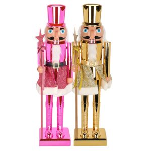 Notenkraker decoratie figuur beelden - set 2x st - 60 cm - goud en roze - kunststof