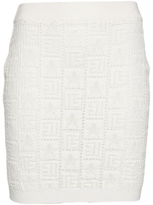 Balmain minijupe à motif monogrammé - Blanc