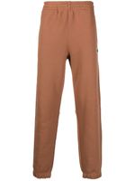 Lacoste pantalon de jogging en coton biologique à logo imprimé - Marron