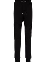 Balmain pantalon de jogging à logo imprimé - Noir