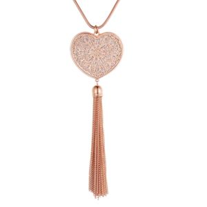 Rosekleurige lange damesketting met hart en kwastje