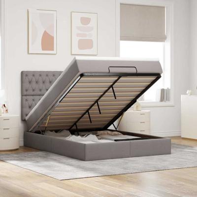 Ottoman bed met matras en LED's 140x190cm stof taupe
