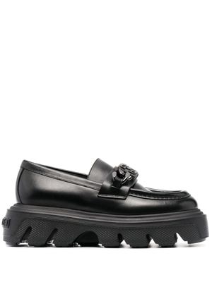 Casadei mocassins en cuir à plaque logo - Noir