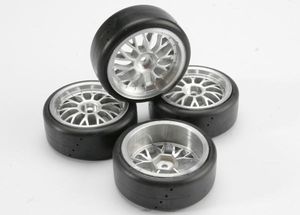 Tires, pro-trax directional on-road (medium compound with contoured inserts) (mounted and glued to part #4872 wheels) (2 left, 2 right)