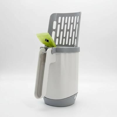 Hygiënische kattenbakschep met ingebouwd opvangzakje