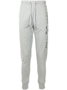 Tommy Hilfiger pantalon de jogging à logo brodé - Gris