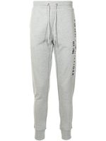 Tommy Hilfiger pantalon de jogging à logo brodé - Gris Tommy Hilfiger pantalon de jogging à logo brodé - Gris