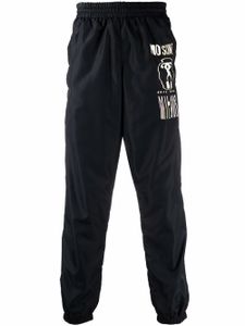Moschino pantalon de jogging à logo imprimé - Noir