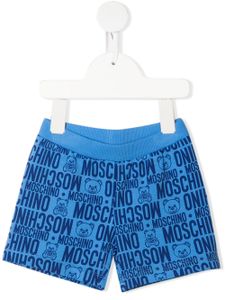 Moschino Kids short à imprimé monogrammé - Bleu