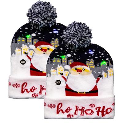 Foute winter muts- 2x - blauw - Ho Ho Ho - met LED lampjes - volwassenen - verlichte kerstmuts