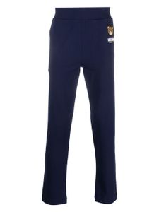 Moschino pantalon de jogging à imprimé Leo Teddy - Bleu