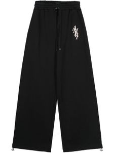 AMIRI pantalon de jogging à logo en caoutchouc - Noir