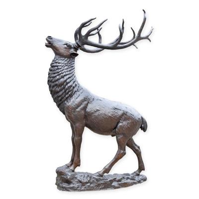 A BRONZE SCULPTURE OF A DEER