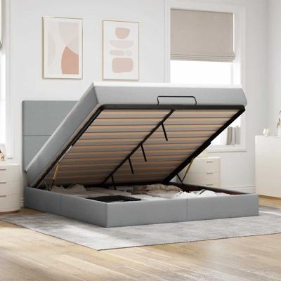 Ottoman bed met matras en LED's 180x200cm stof lichtgrijs