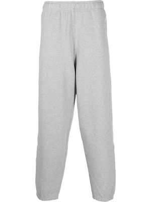 Nike pantalon de jogging à logo Swoosh brodé - Gris