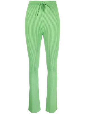 Nanushka pantalon évasé Cornelie en maille nervurée - Vert