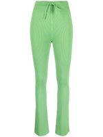 Nanushka pantalon évasé Cornelie en maille nervurée - Vert