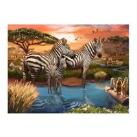Ravensburger Legpuzzel zebra's bij de drinkplaats, 1000st. Ravensburger Legpuzzel zebra's bij de drinkplaats, 1000st.