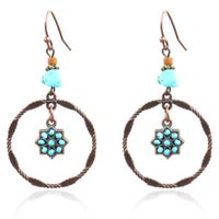 Ronde Boho oorbellen hangers met turquoise ster en steen